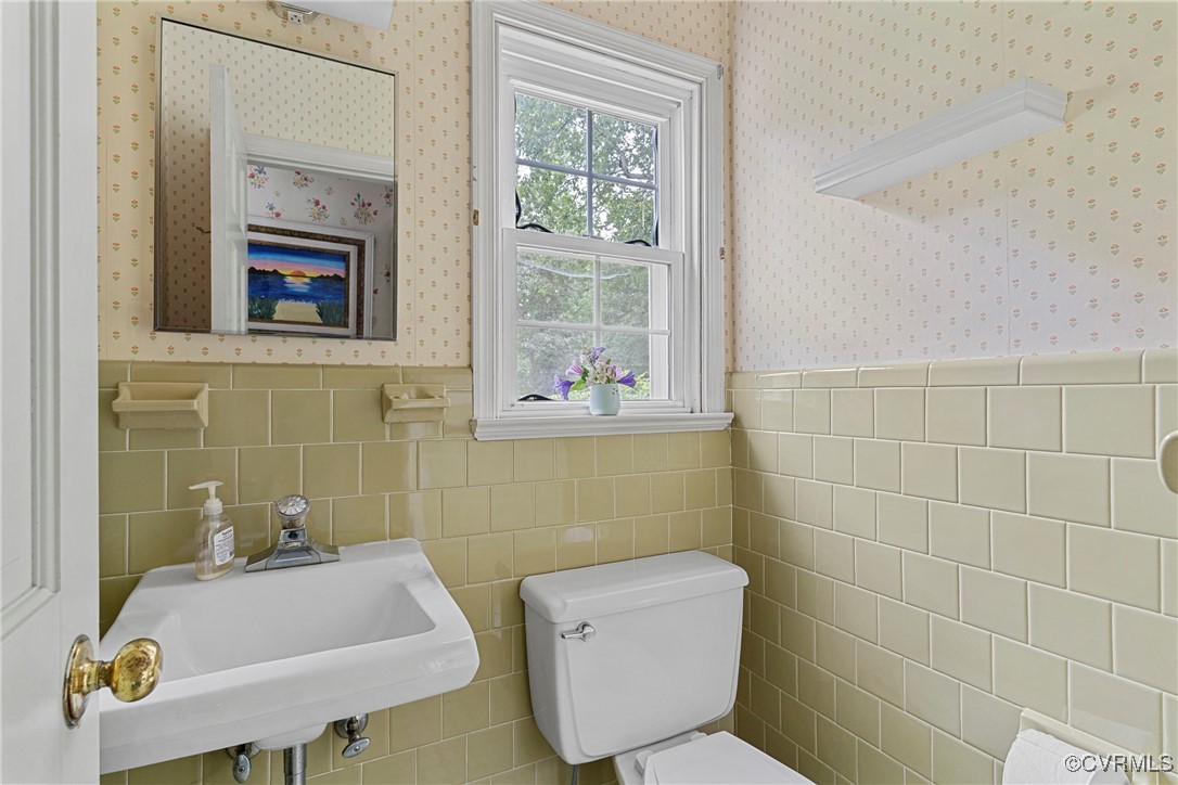 3223 Wood Dale Road Chester, VA 23831 - Photo 18 of 45 Bathroom with wallpapered walls, tile walls, and w
