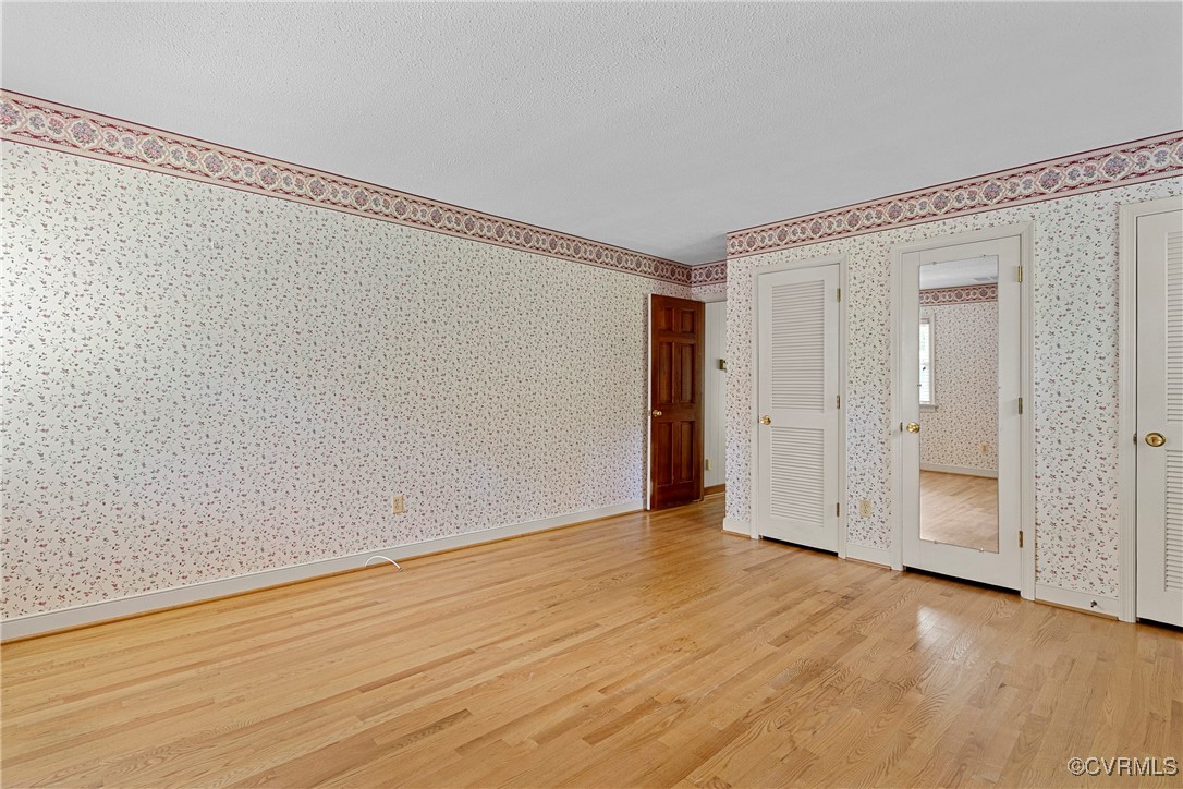 3223 Wood Dale Road Chester, VA 23831 - Photo 25 of 45 Unfurnished room featuring wallpapered walls and l