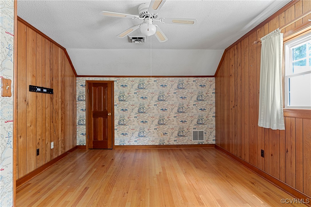 3223 Wood Dale Road Chester, VA 23831 - Photo 31 of 45 Spare room with lofted ceiling, light wood-type fl