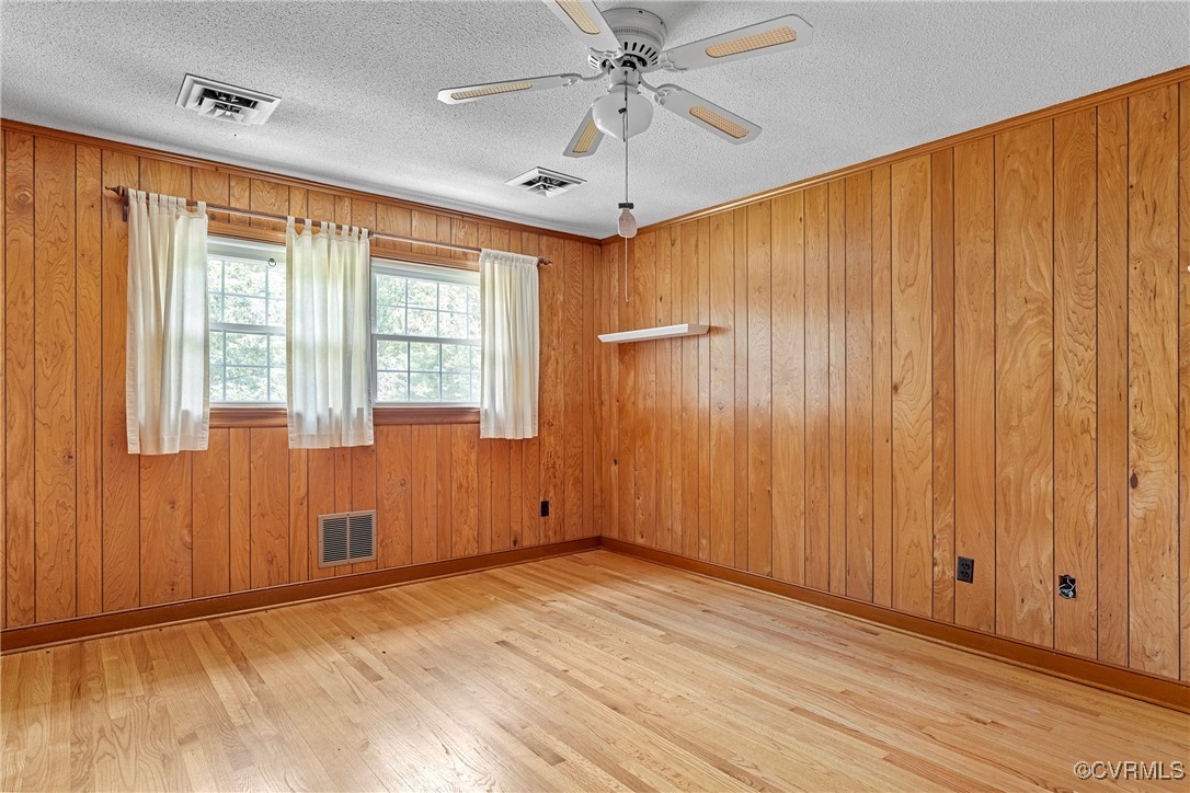 3223 Wood Dale Road Chester, VA 23831 - Photo 32 of 45 Unfurnished room with wood finished floors, a ceil