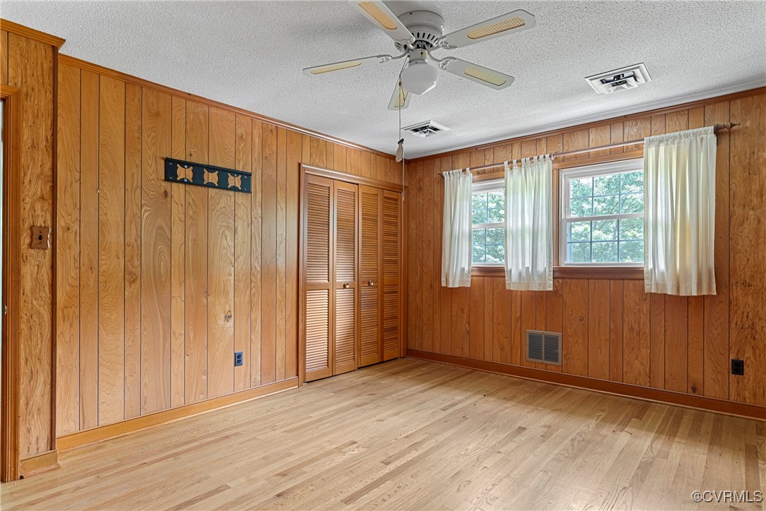 3223 Wood Dale Road Chester, VA 23831 - Photo 33 of 45 Spare room featuring wood finished floors, wooden