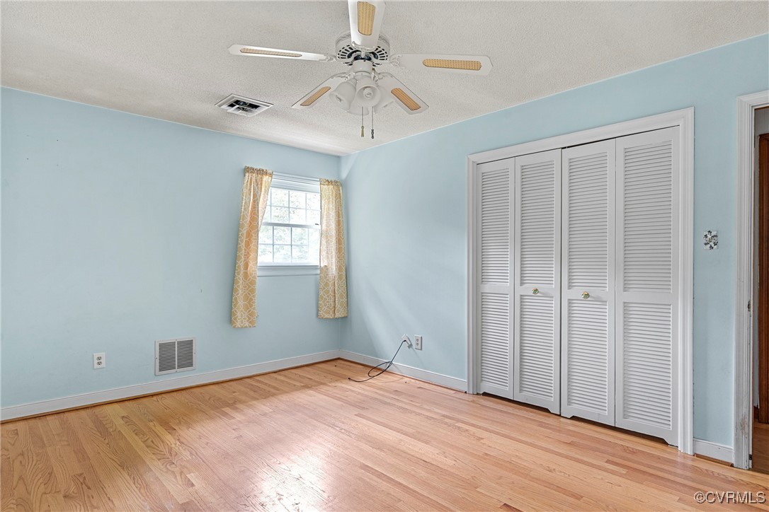 3223 Wood Dale Road Chester, VA 23831 - Photo 36 of 45 Unfurnished bedroom featuring wood finished floors