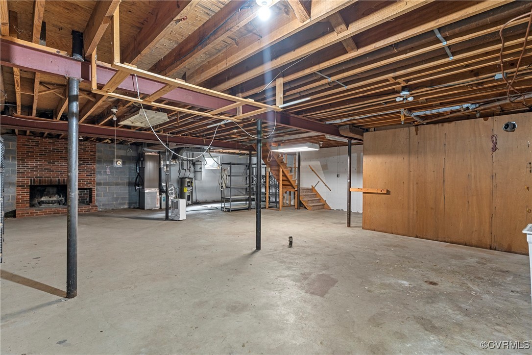 3223 Wood Dale Road Chester, VA 23831 - Photo 42 of 45 Unfinished basement with stairway, heating unit, a