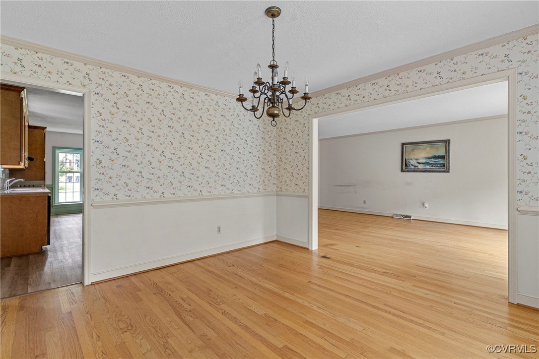 3223 Wood Dale Road Chester, VA 23831 - Photo 9 of 45 Unfurnished room with light wood-type flooring, wa