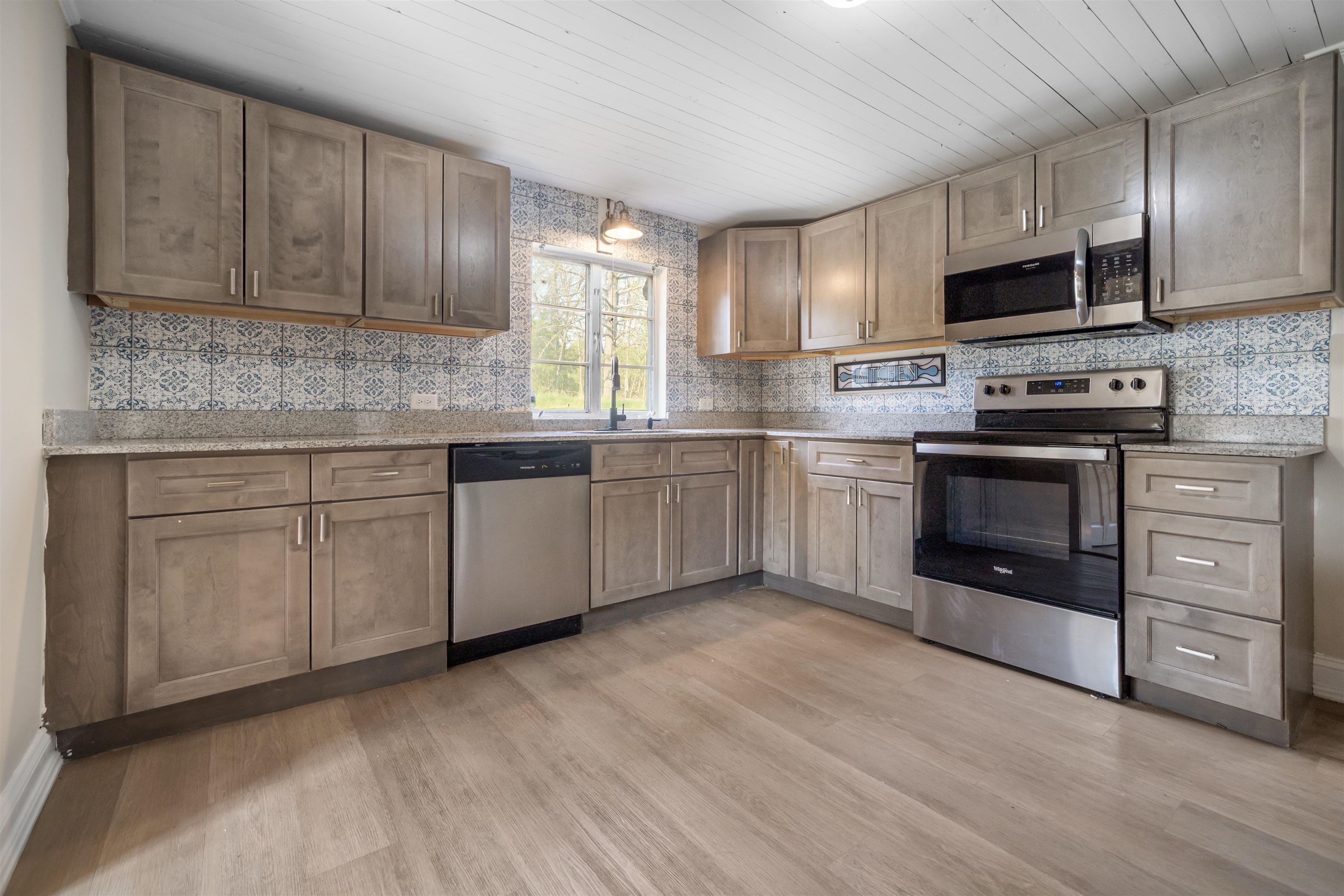 1641 Smithland Road Harrisonburg, VA 22802 - Photo 12 of 44 a kitchen with stainless steel appliances granite countertop a stove sink and cabinets
