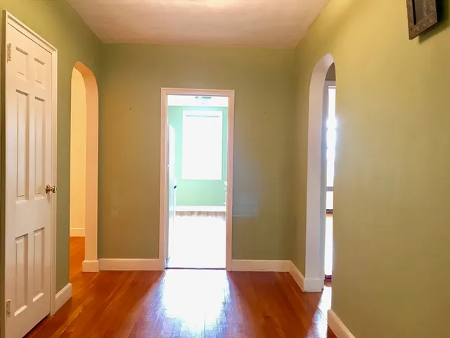 a kitchen with a sink and a refrigerator