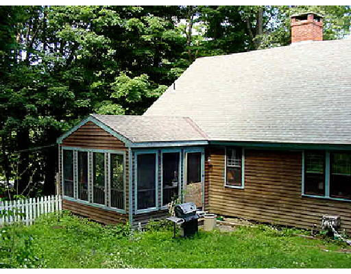 1070A W Road Ashfield, MA 01330 - Photo 2 of 2 a backyard of a house with table and chairs