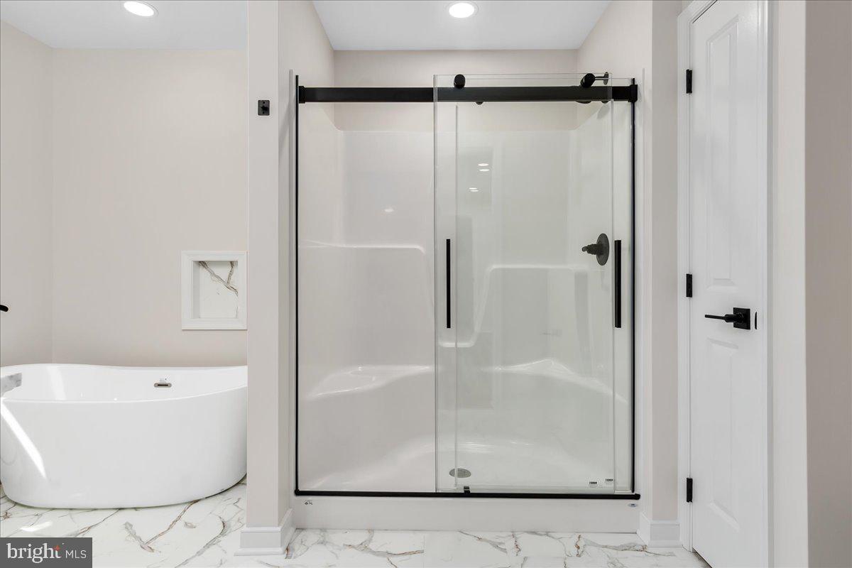 14630 Bain Road Hancock, MD 21750 - Photo 25 of 51 a bathroom with a bathtub and shower