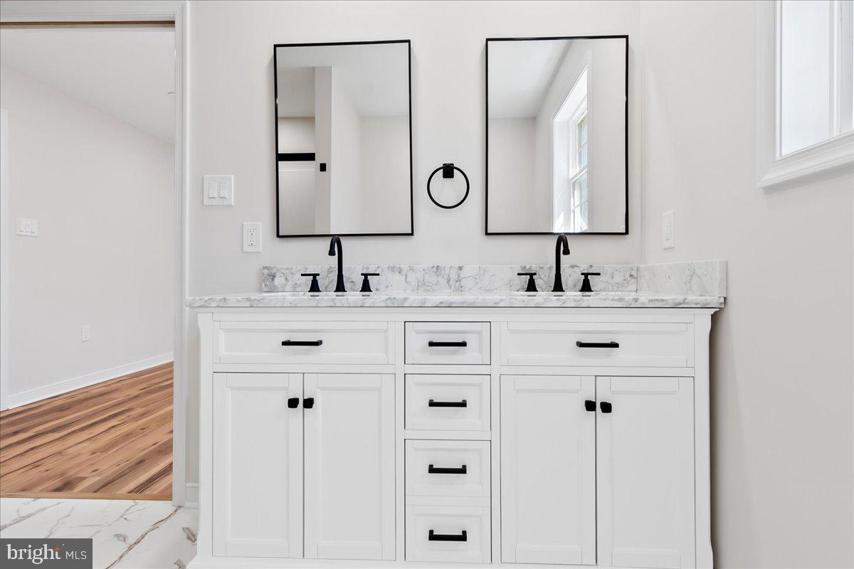 14630 Bain Road Hancock, MD 21750 - Photo 27 of 51 a bathroom with double vanity sink and two mirror