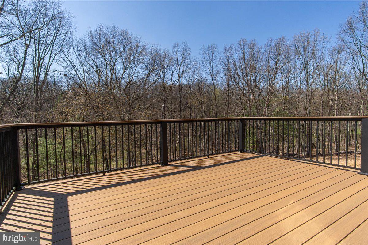 14630 Bain Road Hancock, MD 21750 - Photo 42 of 51 a balcony with trees in front of it
