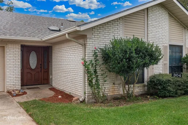 a backyard of a house with lots of green space