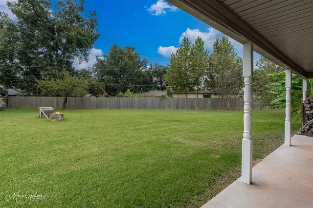 a view of a lake from a yard