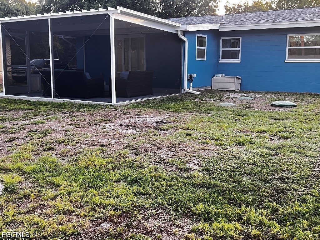 144 Whidden Road North Fort Myers, FL 33917 - Photo 3 of 16 a backyard of a house