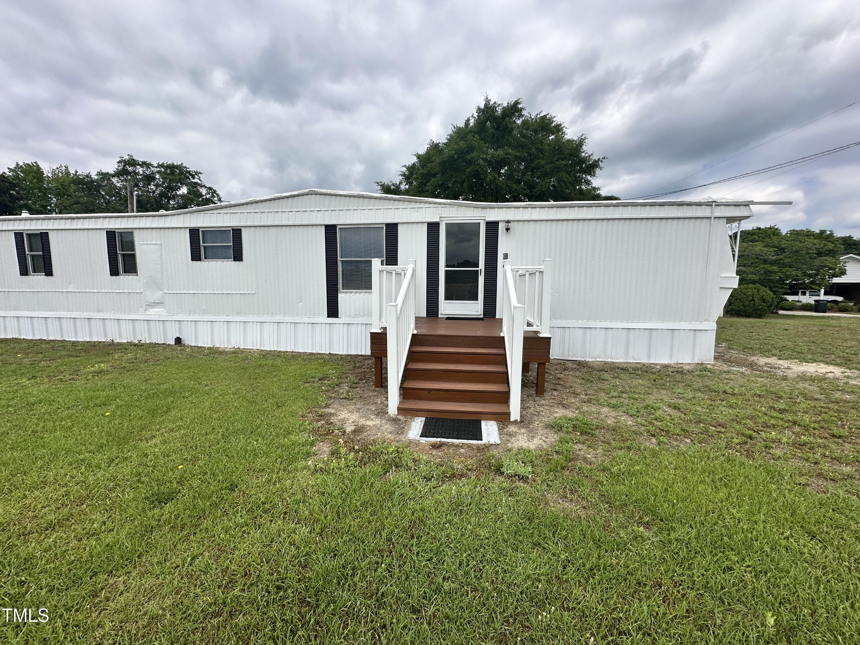 a house view with a garden space
