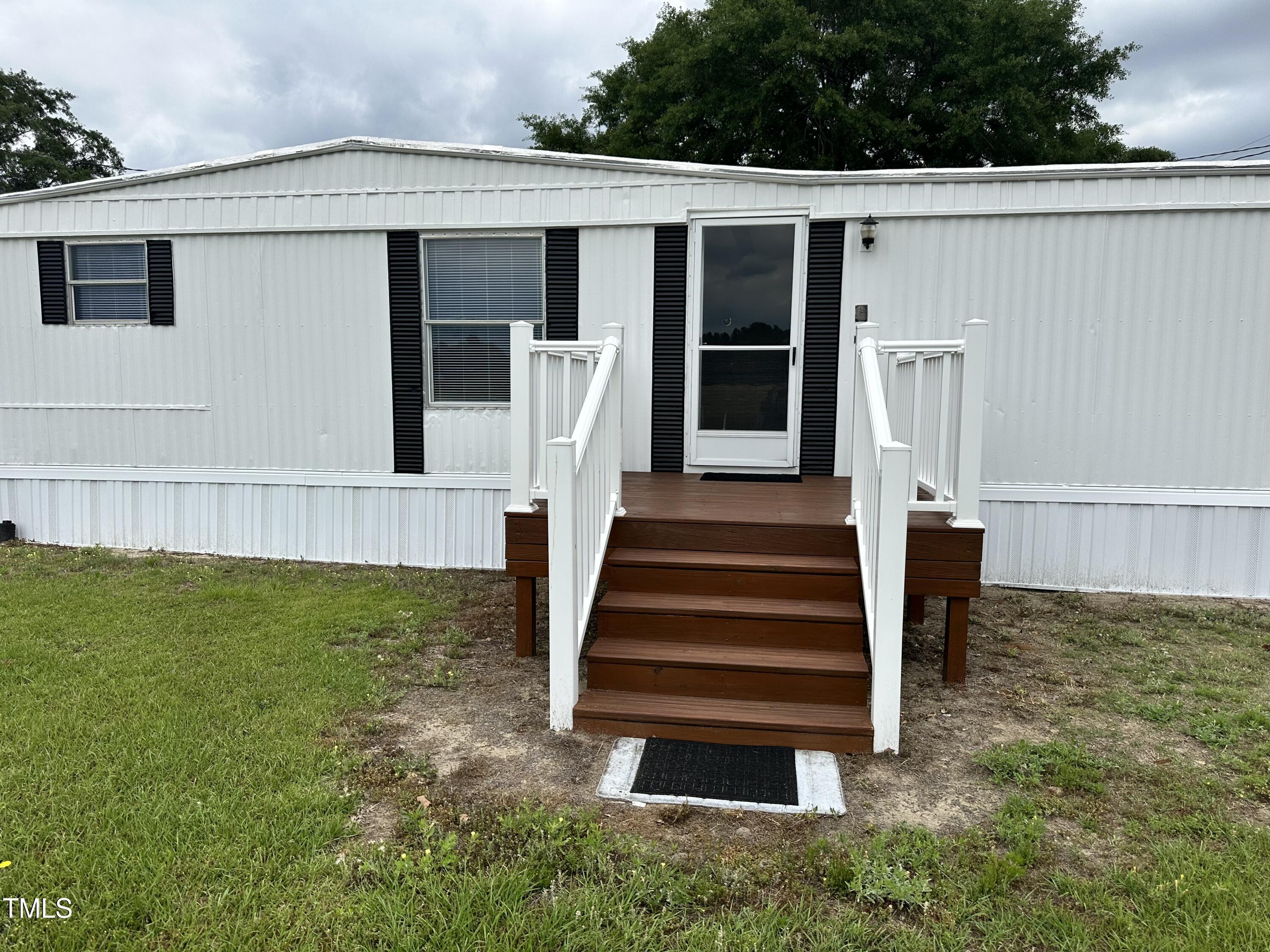 841 Chalybeate Springs Road Angier, NC 27501 - Photo 15 of 24 a view of a back yard of the house
