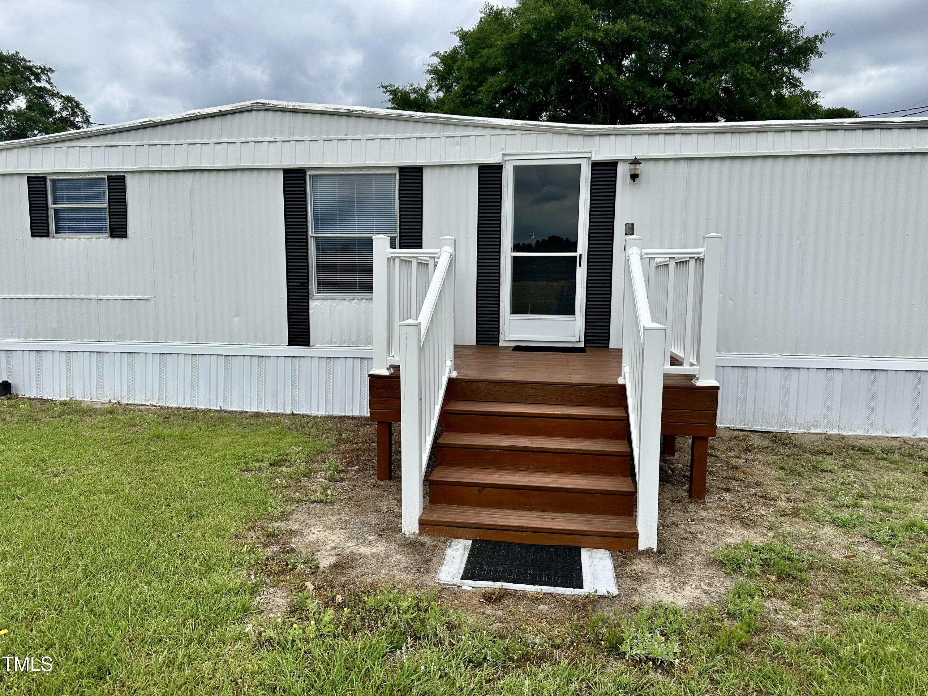 841 Chalybeate Springs Road Angier, NC 27501 - Photo 16 of 24 a view of a back yard of the house