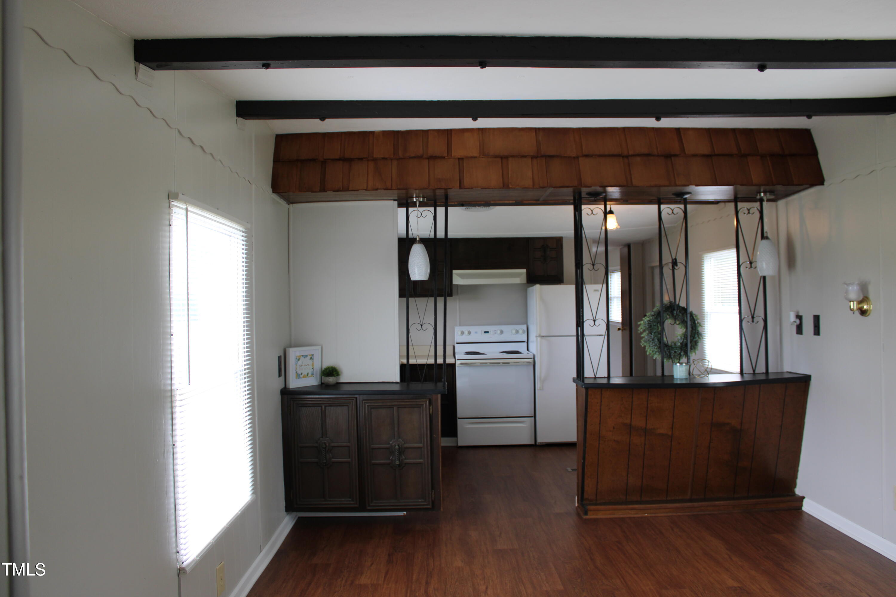 841 Chalybeate Springs Road Angier, NC 27501 - Photo 23 of 24 a kitchen with stainless steel appliances a refrigerator and a stove top oven