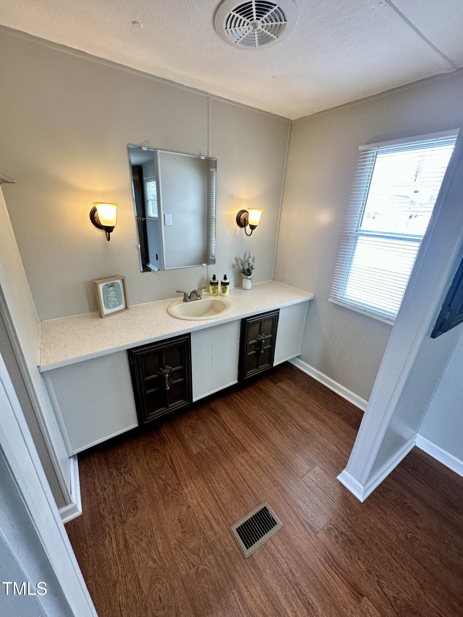 841 Chalybeate Springs Road Angier, NC 27501 - Photo 10 of 24 a large white room with a large window