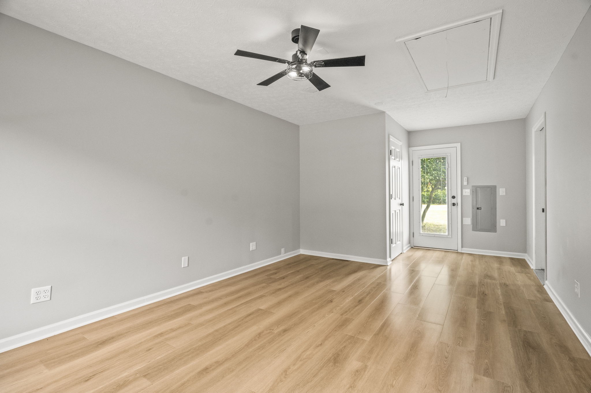 8861 Owens Chapel Road Springfield, TN 37172 - Photo 17 of 22 wooden floor in an empty room with a window