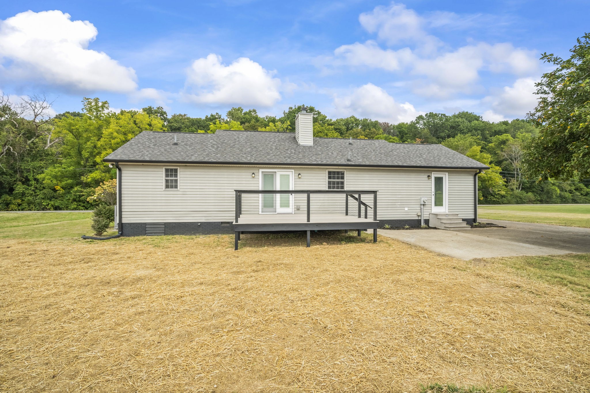 8861 Owens Chapel Road Springfield, TN 37172 - Photo 20 of 22 a house with swimming pool in front of it