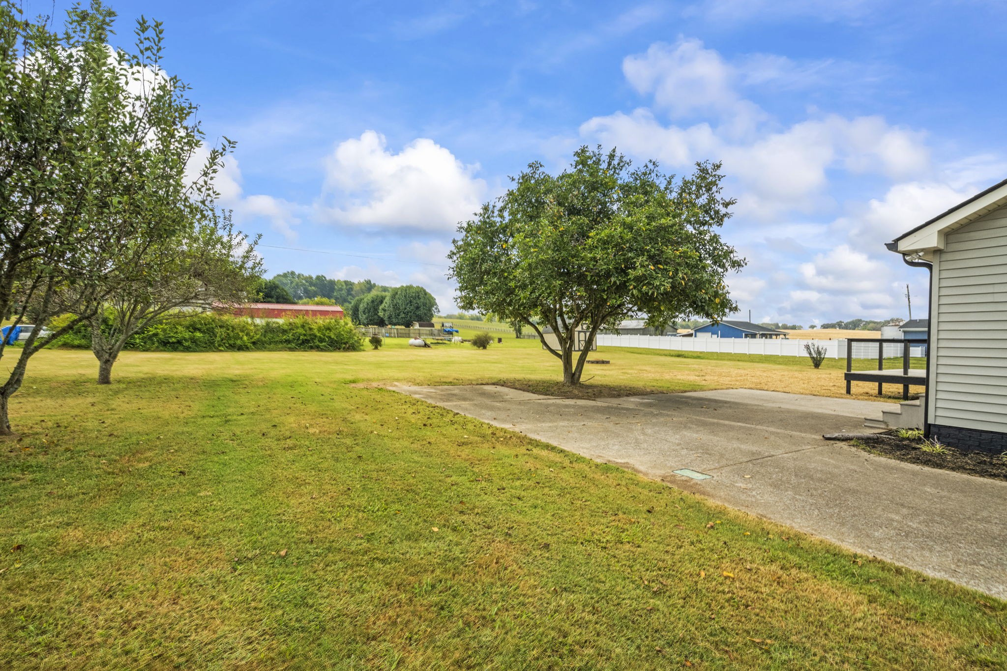 8861 Owens Chapel Road Springfield, TN 37172 - Photo 22 of 22 a view of a swimming pool with an ocean view