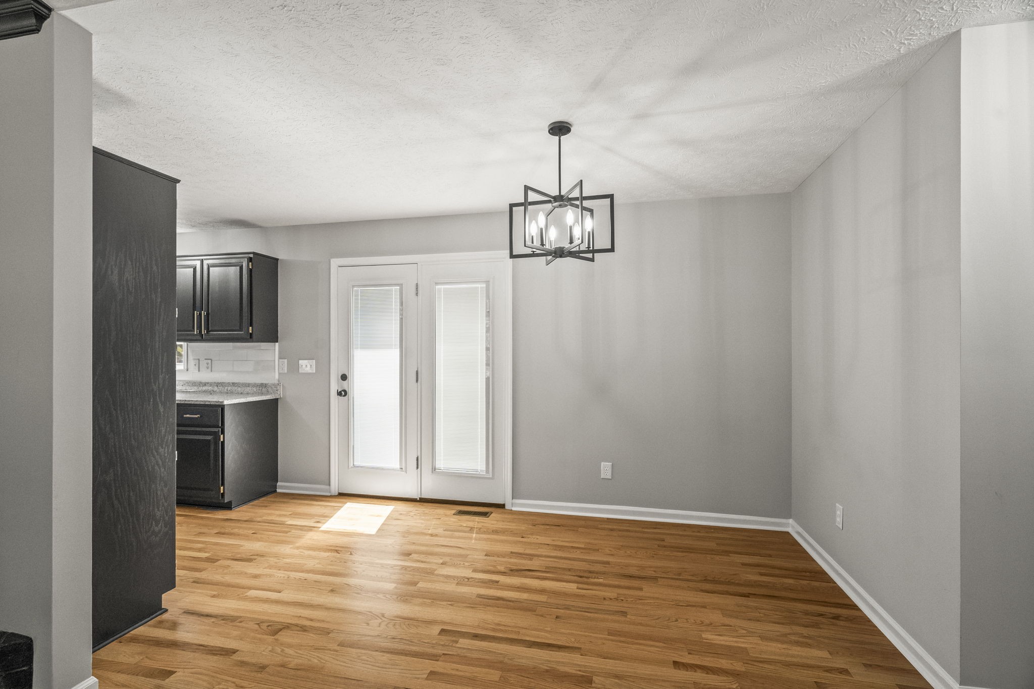 8861 Owens Chapel Road Springfield, TN 37172 - Photo 7 of 22 a view of a kitchen with a sink and a refrigerator