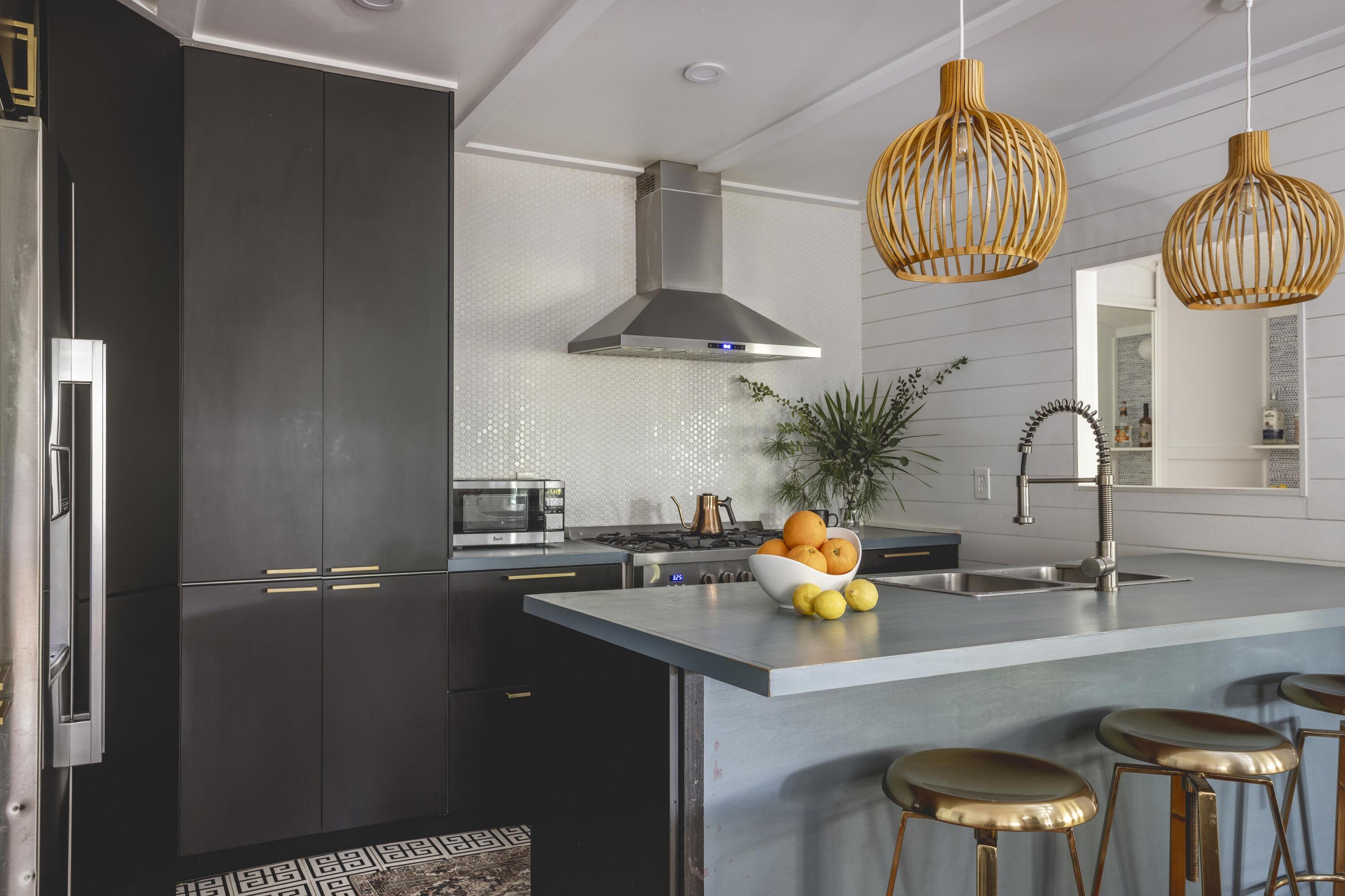 34 Pisces Drive Santa Rosa Beach, FL 32459 - Photo 17 of 70 a kitchen with stainless steel appliances a sink cabinets and wooden floor