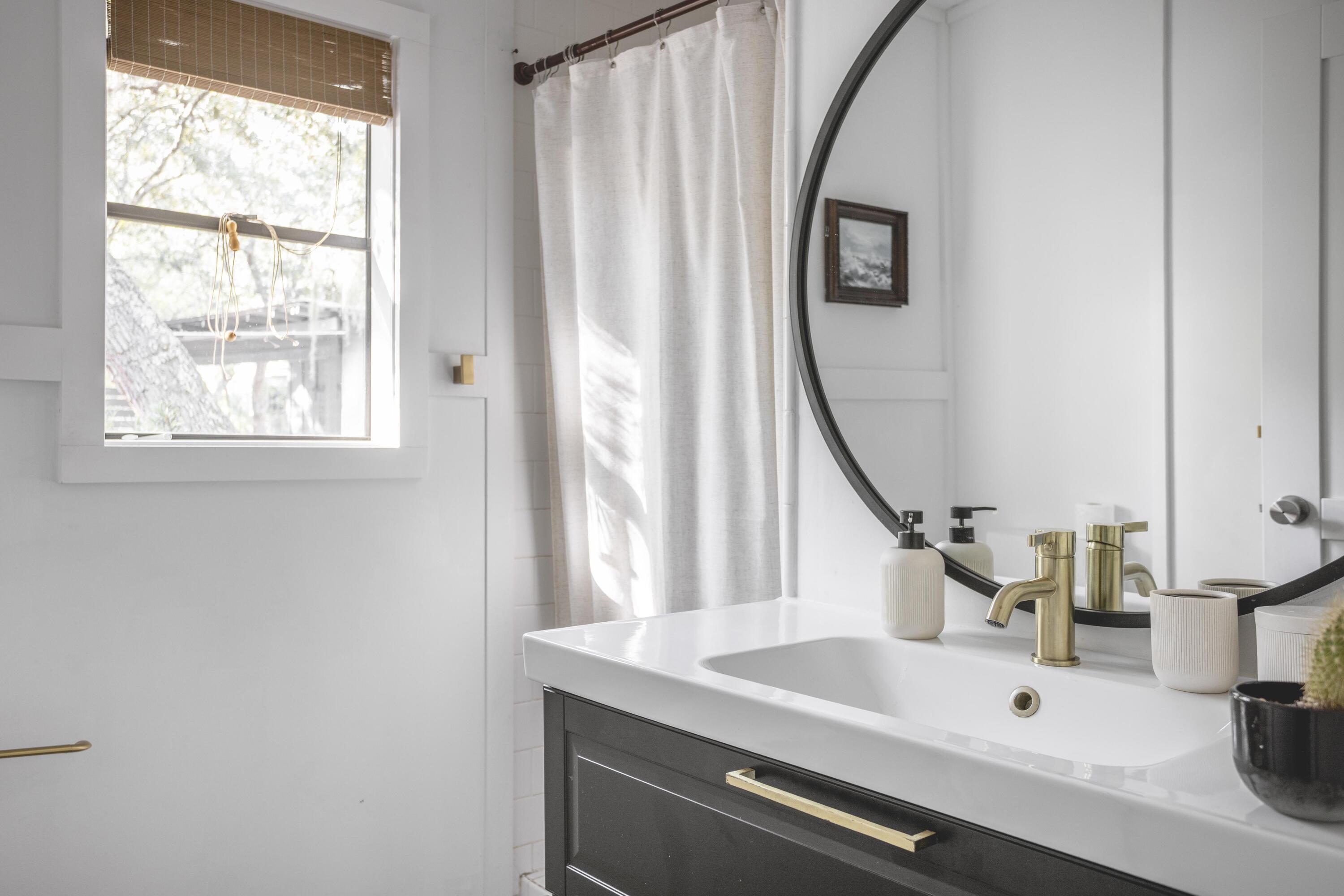 34 Pisces Drive Santa Rosa Beach, FL 32459 - Photo 29 of 70 a bathroom with a sink and a mirror