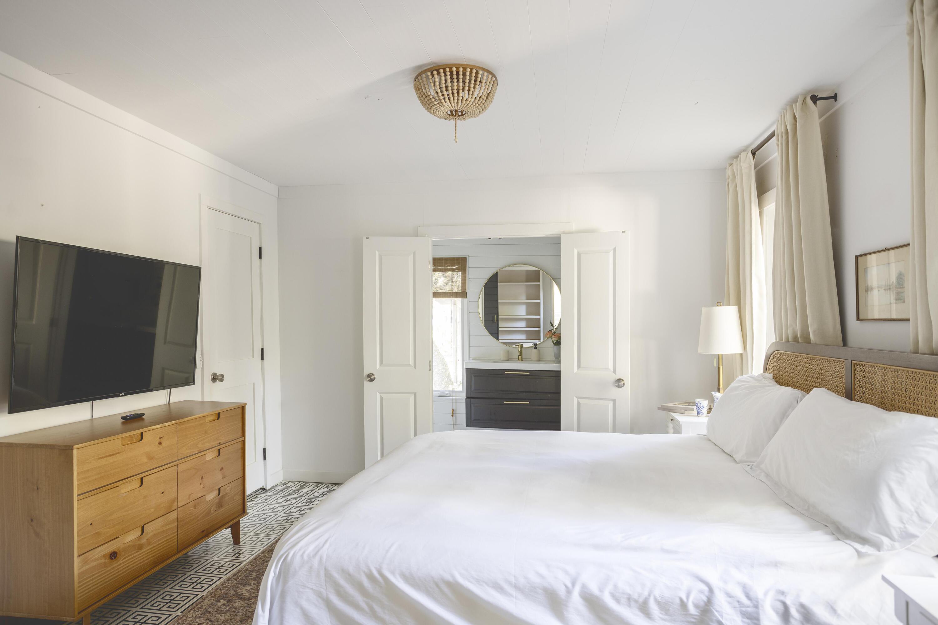 34 Pisces Drive Santa Rosa Beach, FL 32459 - Photo 31 of 70 a bedroom with a bed and a flat screen tv