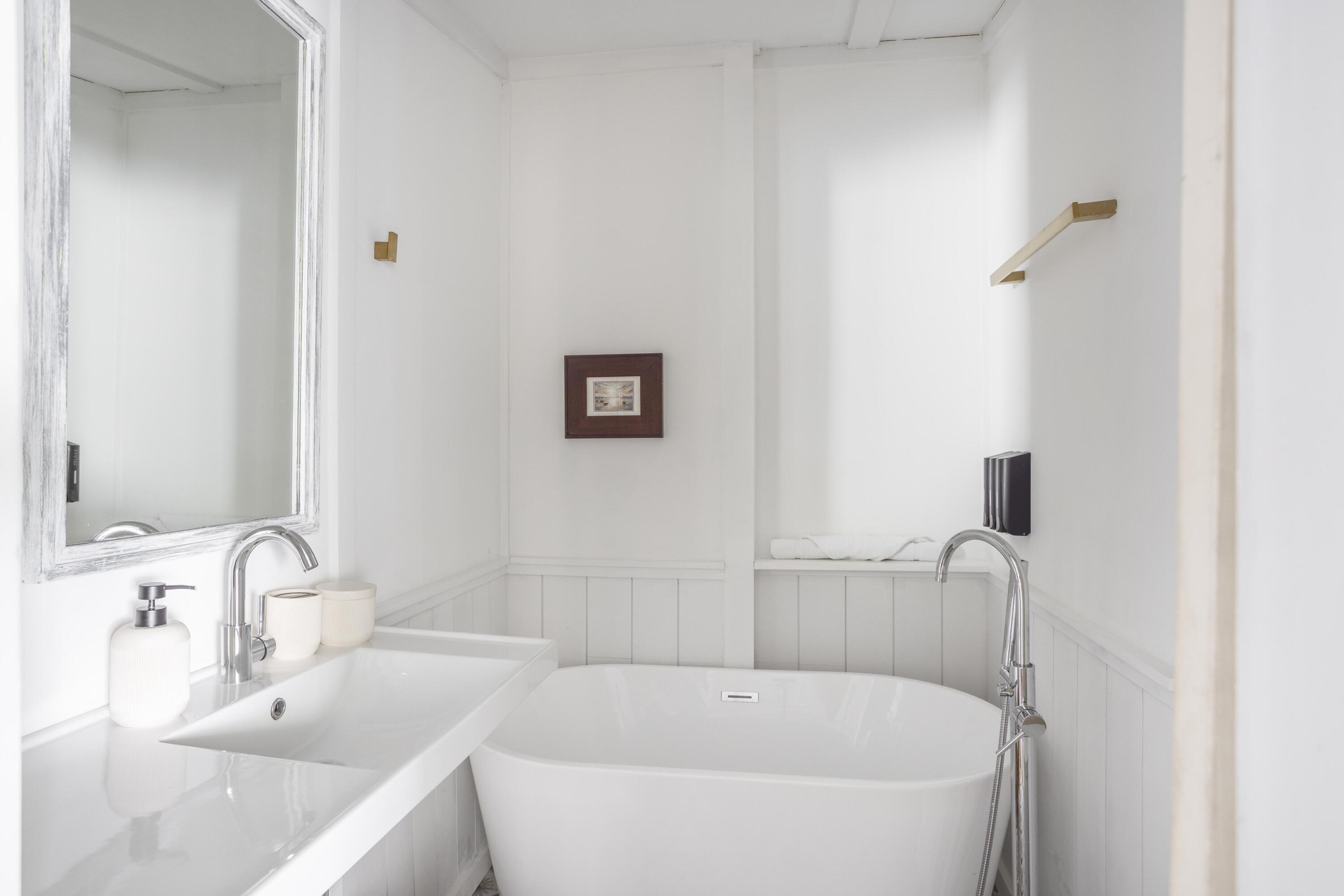 34 Pisces Drive Santa Rosa Beach, FL 32459 - Photo 40 of 70 a white bath tub sitting in a bathroom