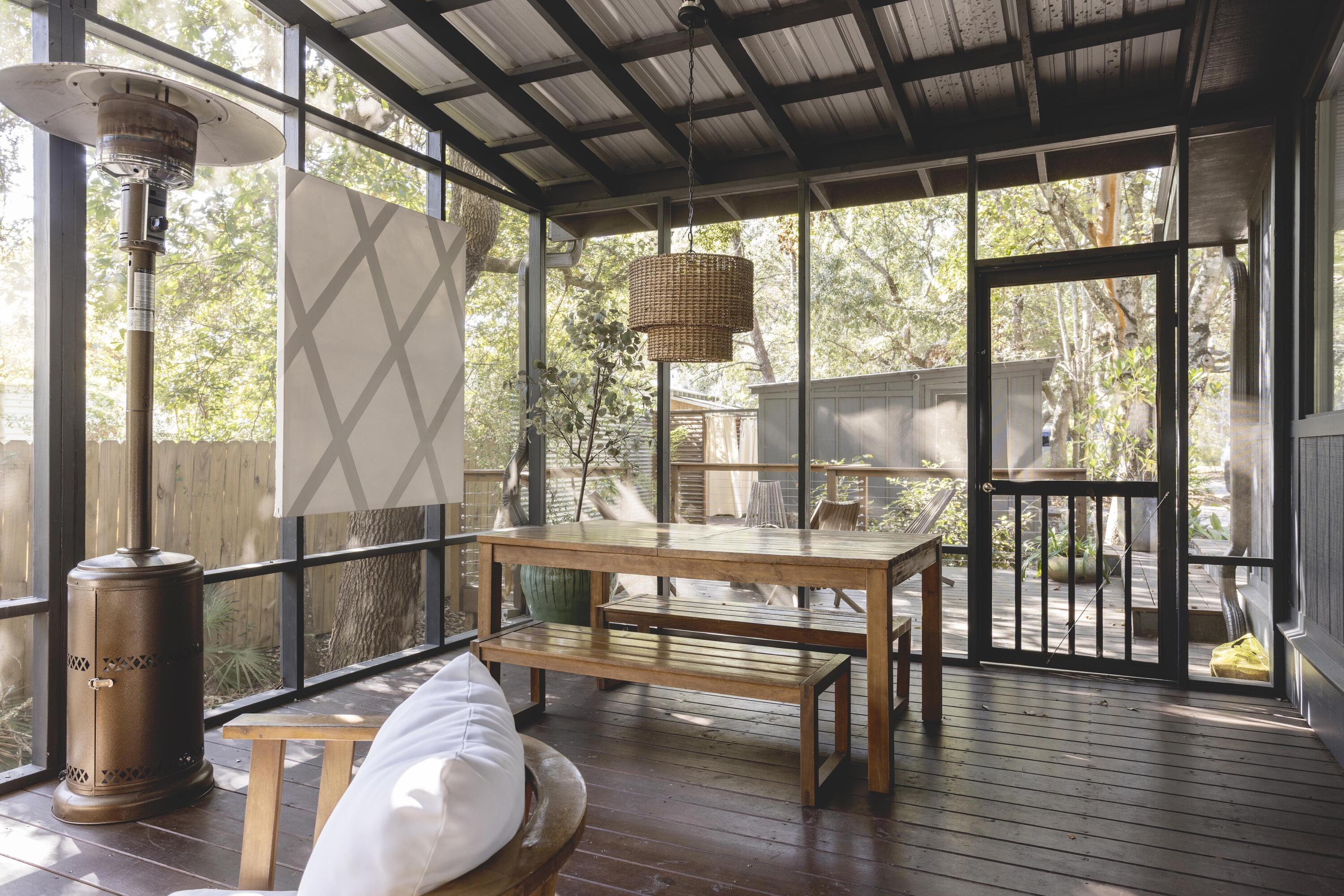 34 Pisces Drive Santa Rosa Beach, FL 32459 - Photo 58 of 70 a living room with wooden floor and a table