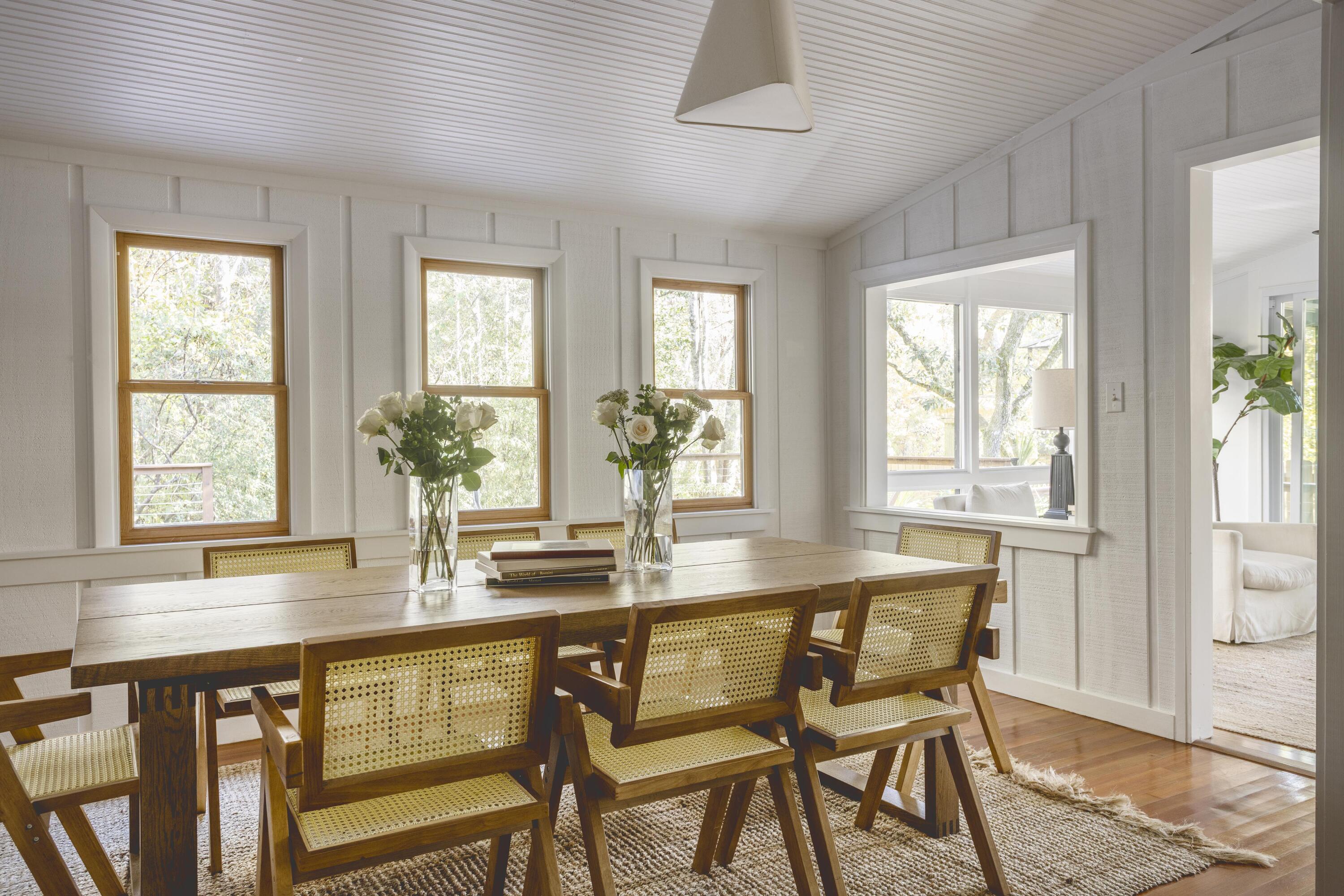 34 Pisces Drive Santa Rosa Beach, FL 32459 - Photo 9 of 70 a dining hall with stainless steel appliances granite countertop a dining table and chairs with wooden floor
