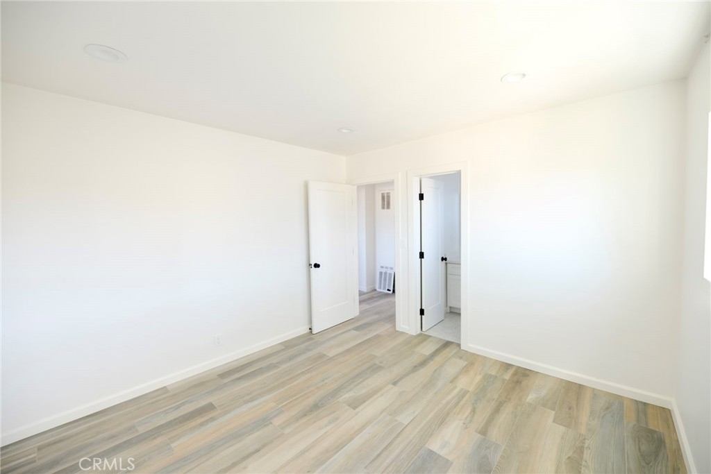 262 Avenida Victoria, Unit 4 San Clemente, CA 92672 - Photo 13 of 24 a view of a room with wooden floor