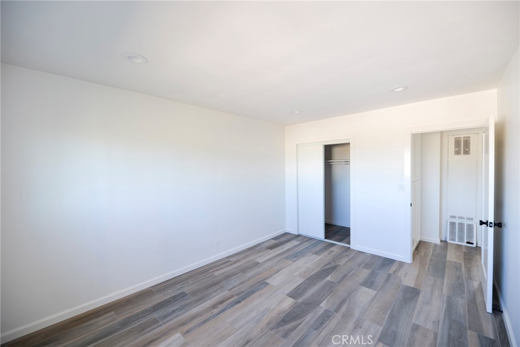 262 Avenida Victoria, Unit 4 San Clemente, CA 92672 - Photo 15 of 24 a view of a room with wooden floor