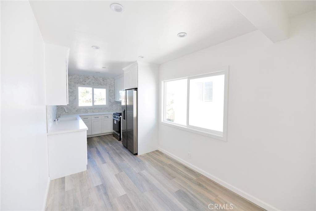 262 Avenida Victoria, Unit 4 San Clemente, CA 92672 - Photo 9 of 24 a view of a kitchen and a sink window