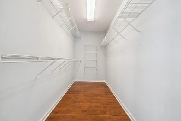 a view of a hallway with stairs