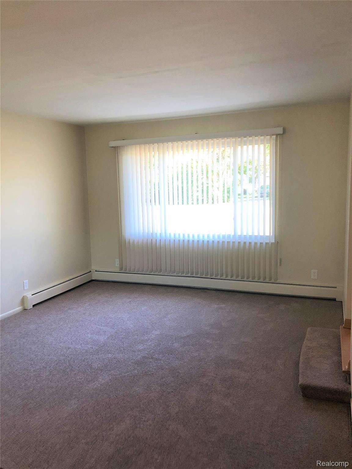 1207 Reid Road Flint, MI 48507 - Photo 11 of 42 6 Living a.jpg