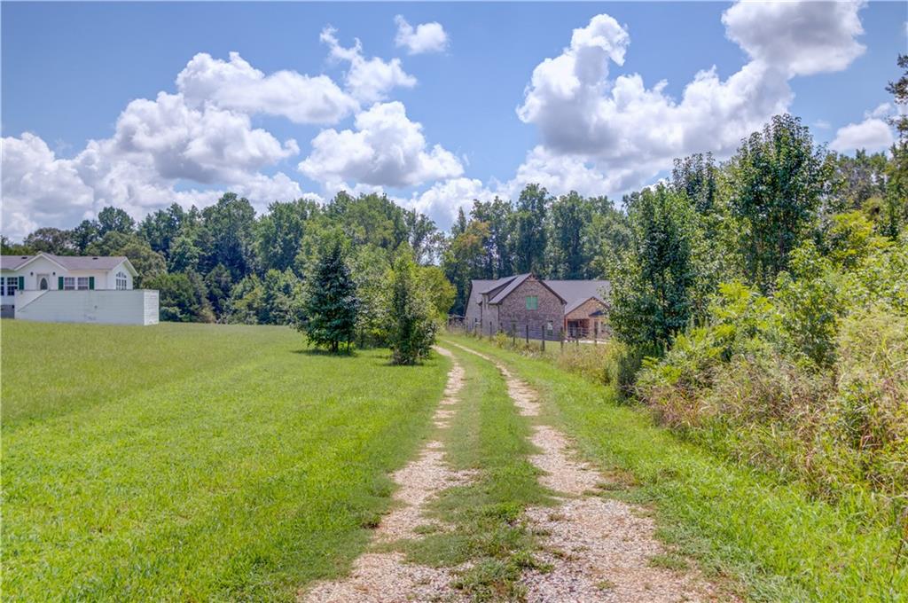 0 Jefferson Road Southeast Statham, GA 30666 - Photo 2 of 18 a view of a fountain in front of the house