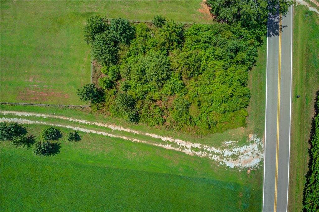 0 Jefferson Road Southeast Statham, GA 30666 - Photo 3 of 18 a view of a field with a tree