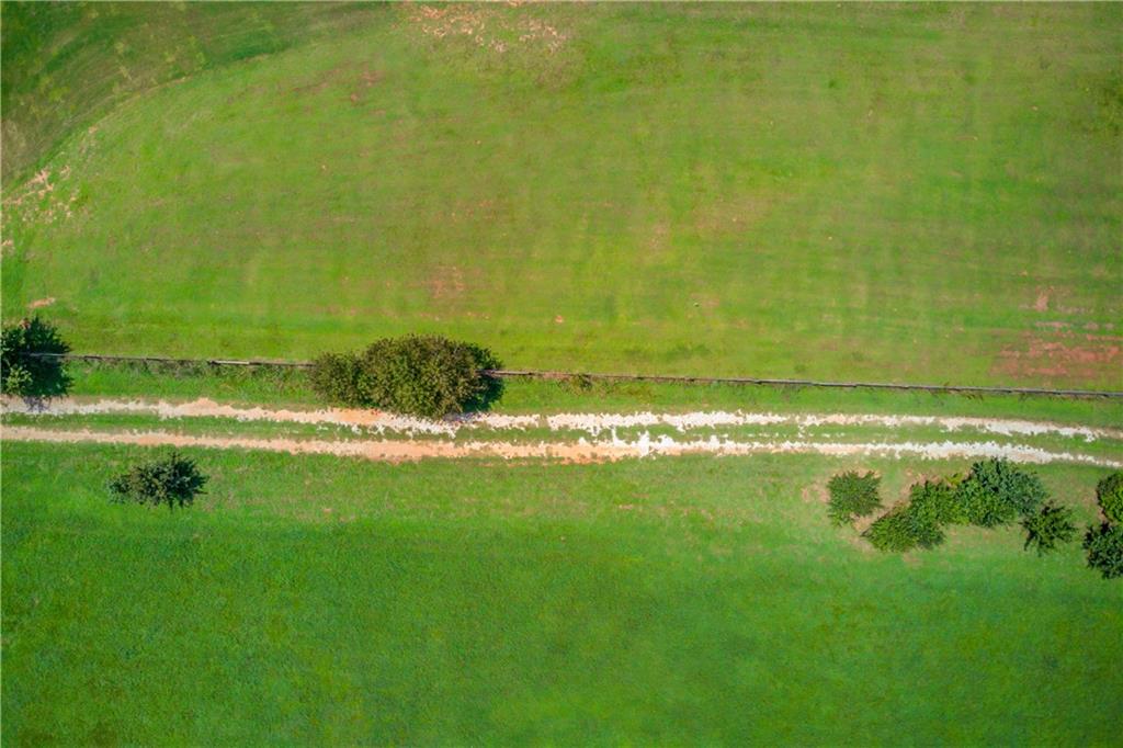 0 Jefferson Road Southeast Statham, GA 30666 - Photo 5 of 18 a view of a lake with a yard