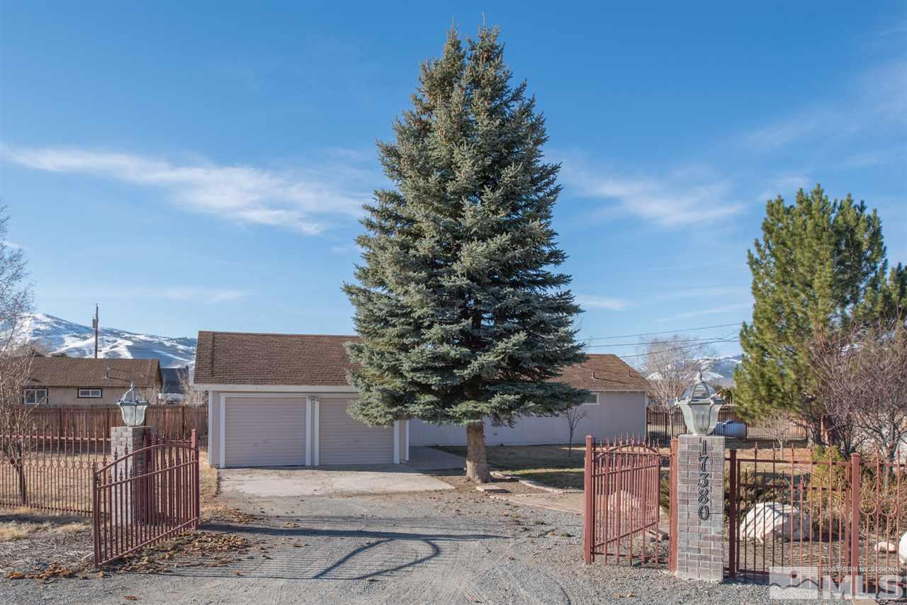17380 Cold Springs Drive Reno, NV 89508 - Photo 1 of 1 a backyard of a house with lots of green space