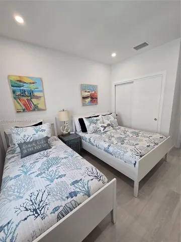 a view of staircase with white walls