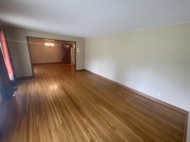 a view of wooden floor and staircase