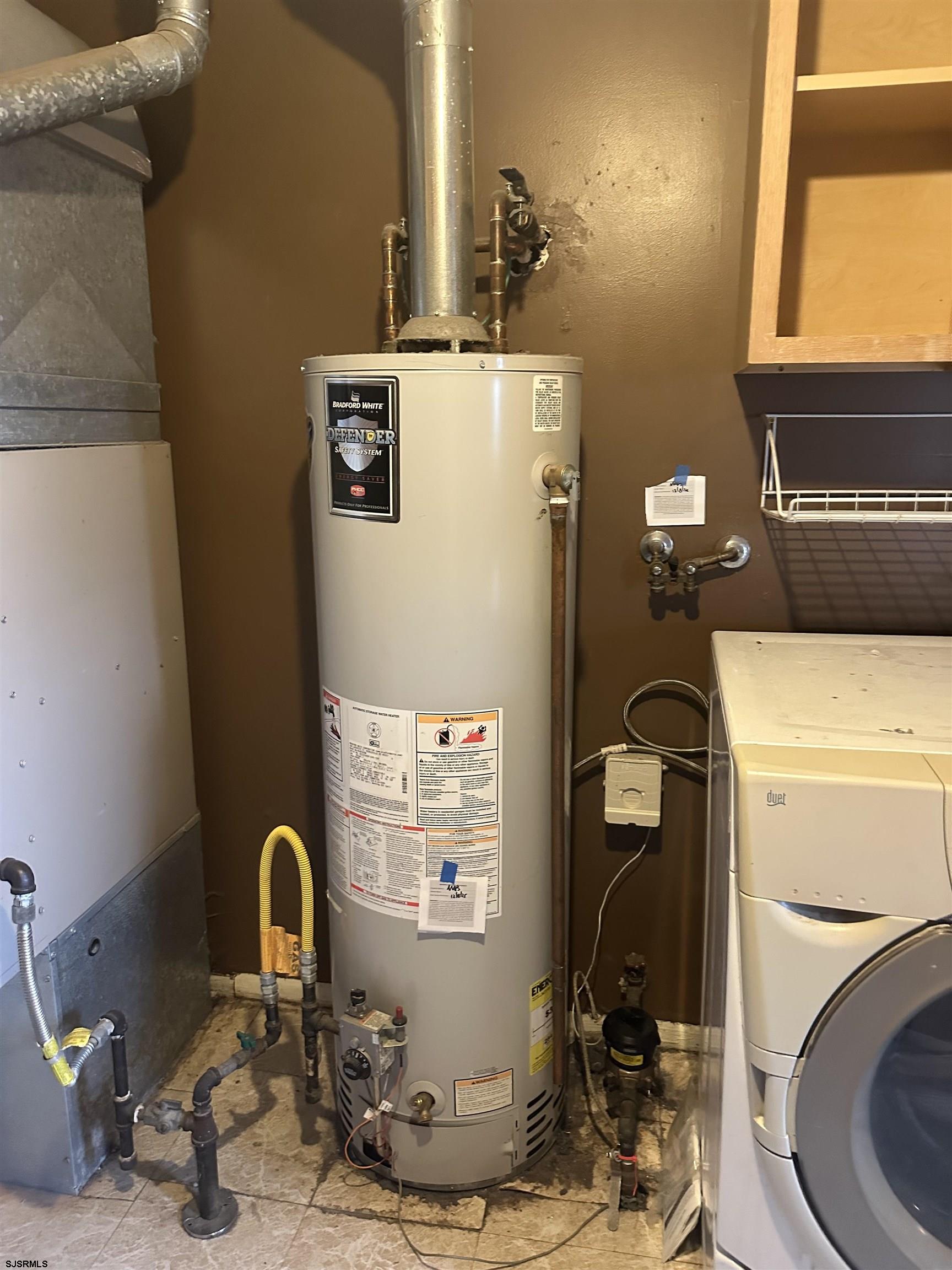 968 Hazelwood Road Toms River, NJ 08753 - Photo 17 of 25 a room with a sink and a mirror