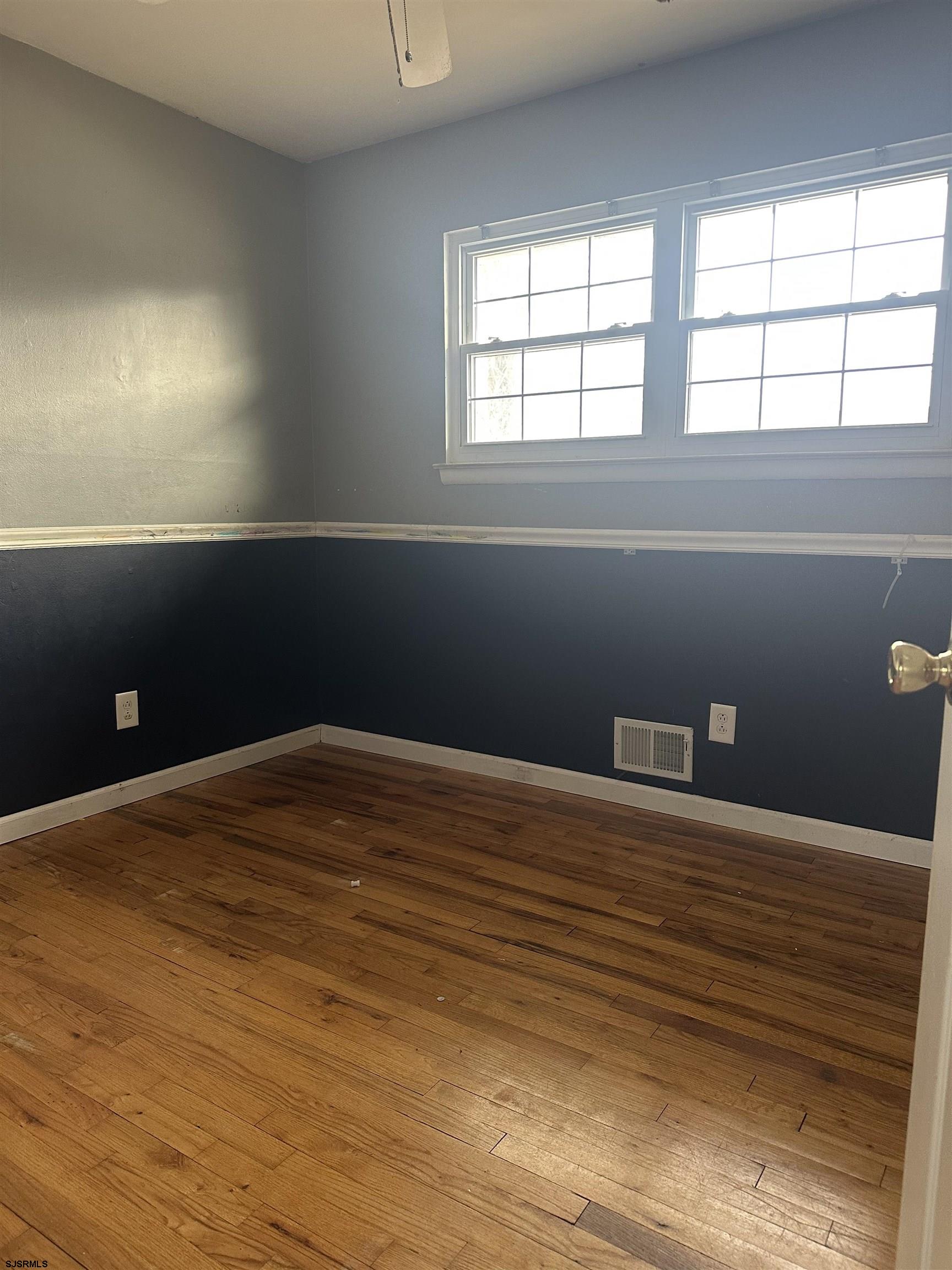 968 Hazelwood Road Toms River, NJ 08753 - Photo 18 of 25 a view of a room with wooden floor and window