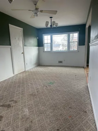 a view of a room with racks on the wall