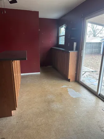 a kitchen with a sink and a window