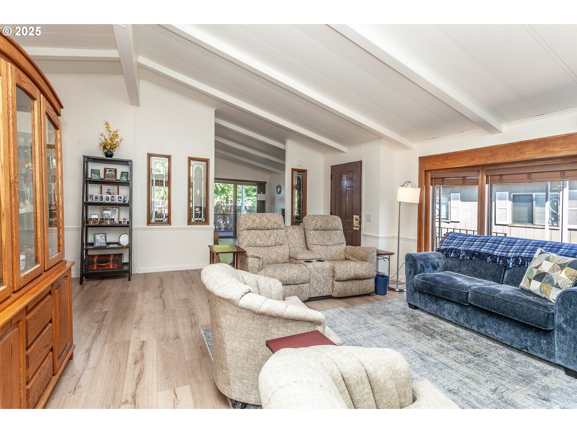 7455 Southeast King Road, Unit 53 Milwaukie, OR 97222 - Photo 3 of 33 a living room with furniture and a large window