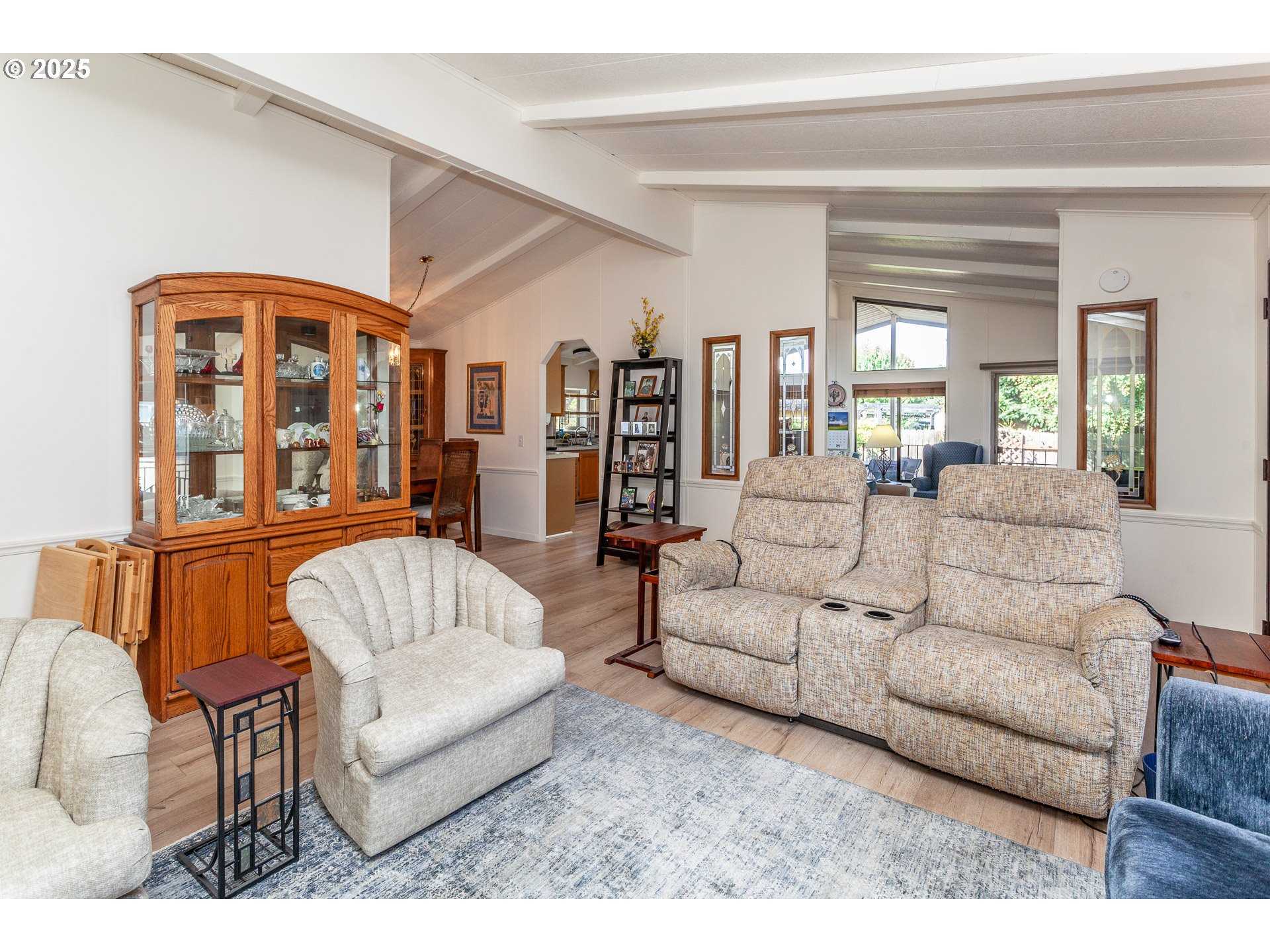 7455 Southeast King Road, Unit 53 Milwaukie, OR 97222 - Photo 4 of 33 a living room with furniture and a large window