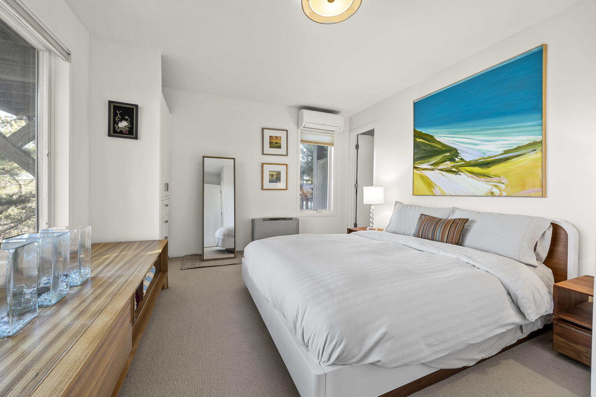 9 Thistlemore Road Provincetown, MA 02657 - Photo 18 of 36 a bedroom with a bed and a large window